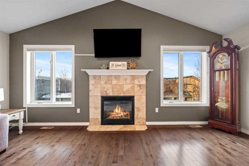 2102 58A Avenue Close, Lloydminster, AB - Indoor Photo Showing Living Room With Fireplace