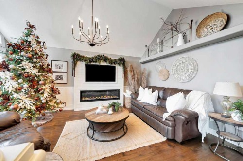 15075, Rural Vermilion River, County Of, AB - Indoor Photo Showing Living Room With Fireplace
