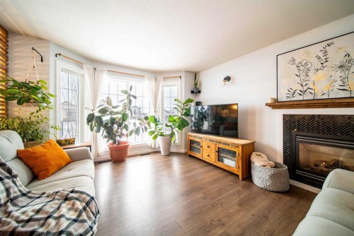 914 26 Street, Wainwright, AB - Indoor Photo Showing Living Room With Fireplace