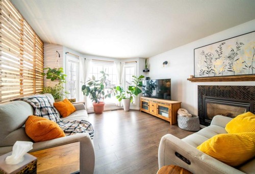 914 26 Street, Wainwright, AB - Indoor Photo Showing Living Room With Fireplace