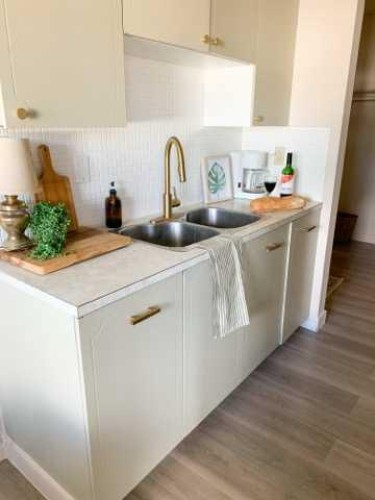 1-8-4504 56A Avenue, Lloydminster, AB - Indoor Photo Showing Kitchen With Double Sink