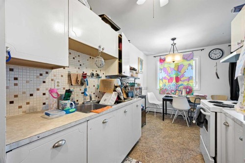 1-8-4504 56A Avenue, Lloydminster, AB - Indoor Photo Showing Kitchen With Double Sink