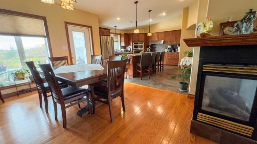 45069 Twp Rd 424, Rural Wainwright No. 61, M.D. Of, AB - Indoor Photo Showing Dining Room With Fireplace