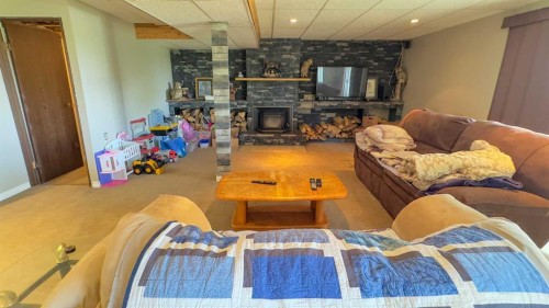 43365 Hwy 881, Hardisty, AB - Indoor With Fireplace