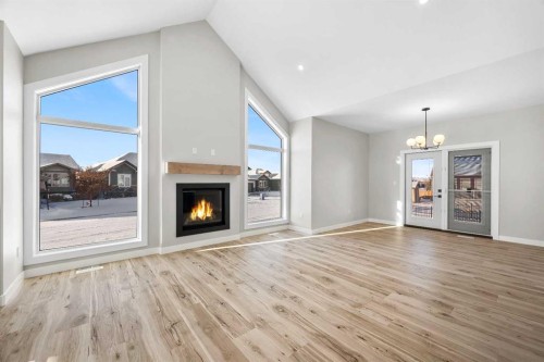 30-2715 73 Avenue, Lloydminster, AB - Indoor Photo Showing Living Room With Fireplace