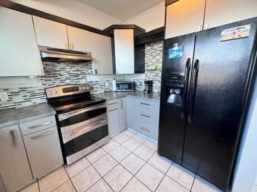 #27 West Bay Estates, Sandy Beach (Sask), SK - Indoor Photo Showing Kitchen