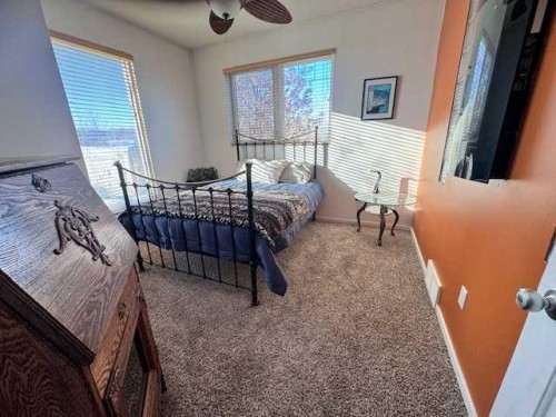 #27 West Bay Estates, Sandy Beach (Sask), SK - Indoor Photo Showing Bedroom