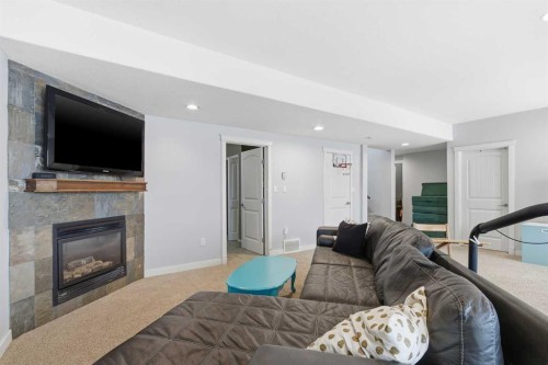 5206 15 Street, Lloydminster, AB - Indoor Photo Showing Living Room With Fireplace