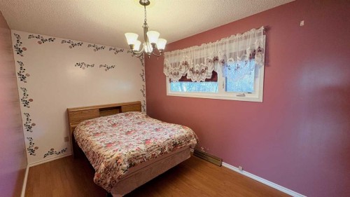 1030 15 Avenue, Wainwright, AB - Indoor Photo Showing Bedroom