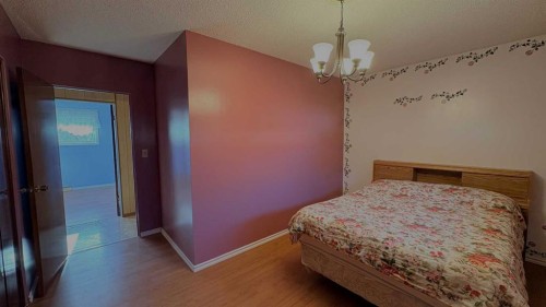 1030 15 Avenue, Wainwright, AB - Indoor Photo Showing Bedroom