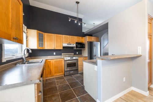 6105 21 Street, Lloydminster, AB - Indoor Photo Showing Kitchen With Double Sink