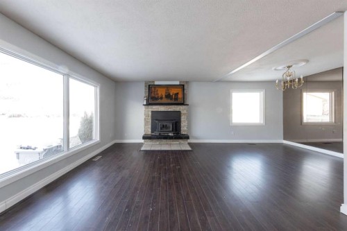 3403 55 Avenue, Lloydminster, AB - Indoor Photo Showing Living Room With Fireplace