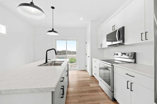 1306 56 Avenue, Lloydminster, AB - Indoor Photo Showing Kitchen With Double Sink With Upgraded Kitchen