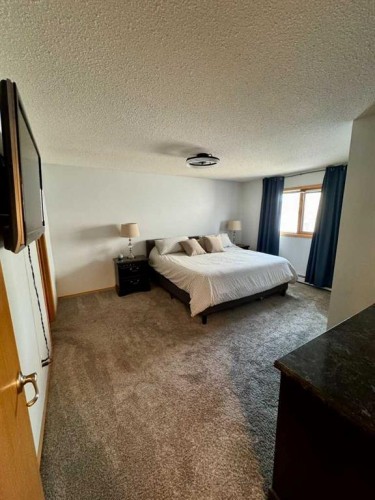 1925 5 Avenue, Wainwright, AB - Indoor Photo Showing Bedroom