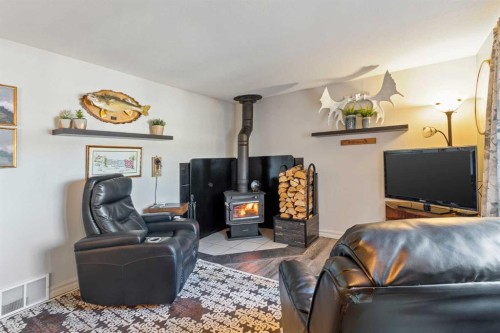 1013 Osprey Drive, Livelong, SK - Indoor Photo Showing Living Room With Fireplace