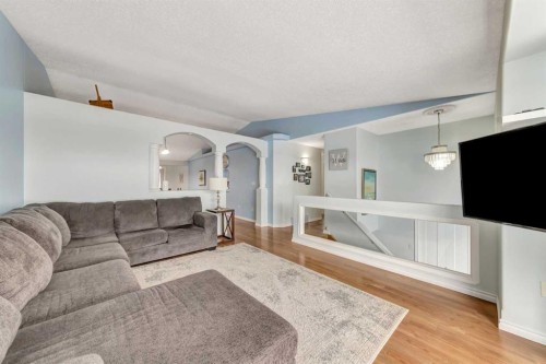 3204 65 Avenue, Lloydminster, AB - Indoor Photo Showing Living Room With Fireplace