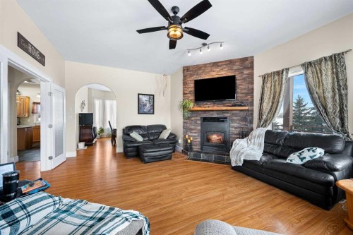 31060 Twn 504, Kitscoty, AB - Indoor Photo Showing Living Room With Fireplace