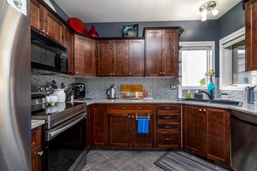 3812 58 Avenue, Lloydminster, AB - Indoor Photo Showing Kitchen With Double Sink