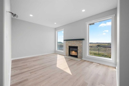 1812 63 Avenue, Lloydminster, AB - Indoor Photo Showing Living Room With Fireplace