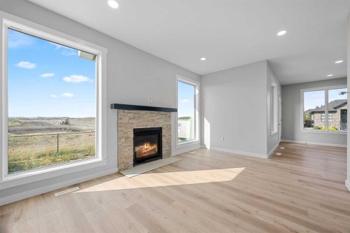 1812 63 Avenue, Lloydminster, AB - Indoor Photo Showing Living Room With Fireplace