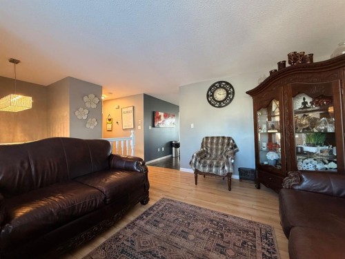 4009 59 Avenue Close, Lloydminster, AB - Indoor Photo Showing Living Room