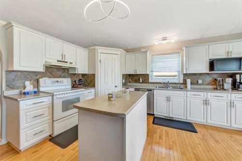 2307 57B Avenue, Lloydminster, AB - Indoor Photo Showing Kitchen With Double Sink