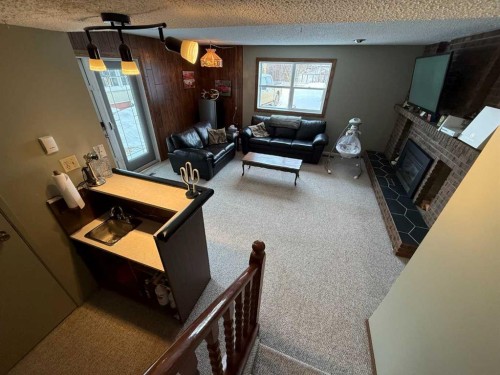4606 50 Avenue, Vermilion, AB - Indoor With Fireplace