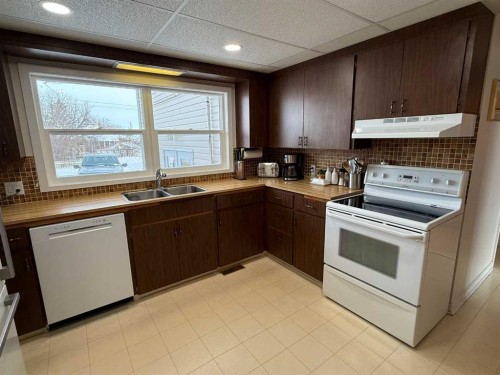 4606 50 Avenue, Vermilion, AB - Indoor Photo Showing Kitchen With Double Sink