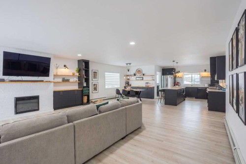638 9 Avenue, Wainwright, AB - Indoor Photo Showing Living Room With Fireplace