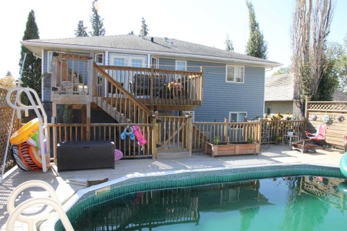 220 1 Avenue East, Maidstone, SK - Outdoor With In Ground Pool With Deck Patio Veranda