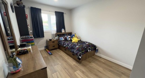 906 10 Avenue, Wainwright, AB - Indoor Photo Showing Bedroom