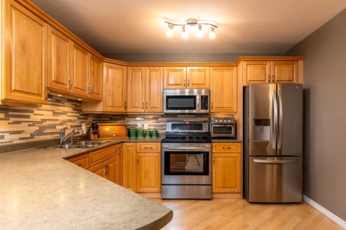 2404B 57A Avenue, Lloydminster, AB - Indoor Photo Showing Kitchen With Double Sink