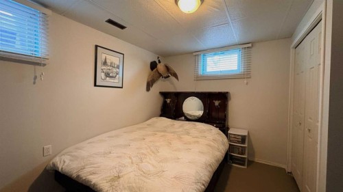 725 7 Avenue, Wainwright, AB - Indoor Photo Showing Bedroom