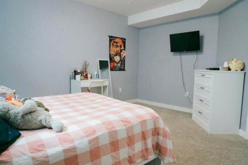 2719 11 Avenue, Wainwright, AB - Indoor Photo Showing Bedroom