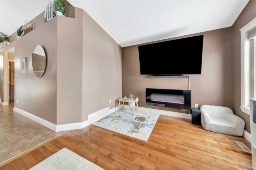 4112 74 Avenue, Lloydminster, AB - Indoor Photo Showing Living Room With Fireplace