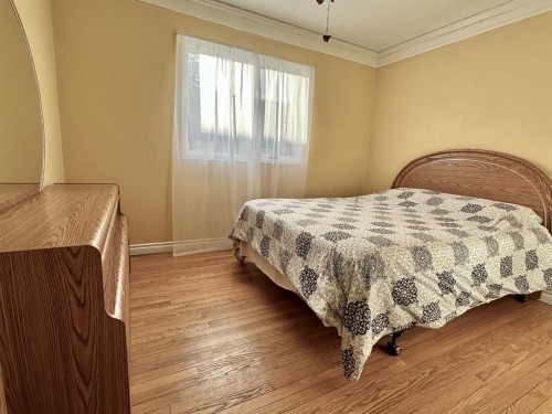 1217 4 Avenue, Wainwright, AB - Indoor Photo Showing Bedroom