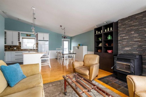 2912 65 Avenue Place, Lloydminster, AB - Indoor Photo Showing Living Room With Fireplace