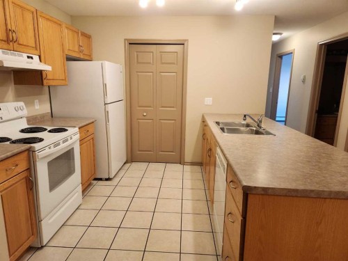 102A-6608 42, Lloydminster, AB - Indoor Photo Showing Kitchen With Double Sink