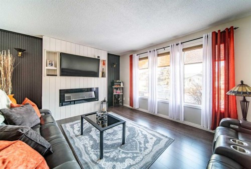 1657 6 Avenue, Wainwright, AB - Indoor Photo Showing Living Room With Fireplace