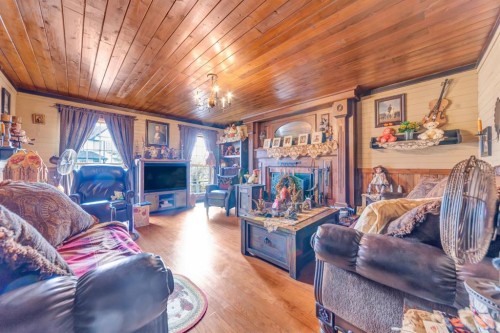 3002 67 Avenue, Lloydminster, AB - Indoor Photo Showing Living Room With Fireplace