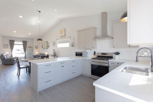 514 24 Street, Wainwright, AB - Indoor Photo Showing Kitchen With Double Sink