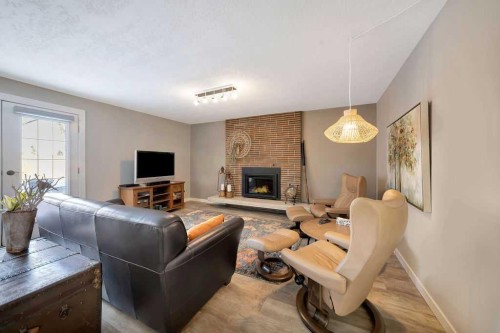 810 10 Avenue, Wainwright, AB - Indoor Photo Showing Living Room With Fireplace