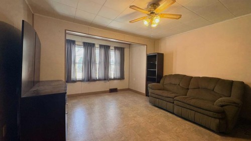 1209 5 Avenue, Wainwright, AB - Indoor Photo Showing Living Room