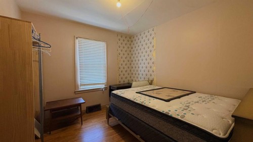 1209 5 Avenue, Wainwright, AB - Indoor Photo Showing Bedroom