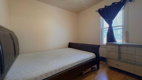 1209 5 Avenue, Wainwright, AB - Indoor Photo Showing Bedroom
