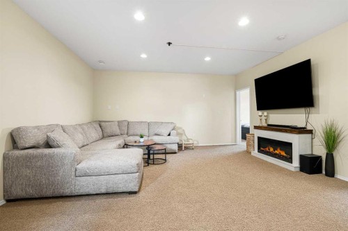 3908 74 Avenue, Lloydminster, AB - Indoor Photo Showing Other Room With Fireplace