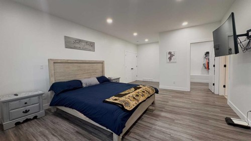 451043 Rng Rd 65, Wainwright, AB - Indoor Photo Showing Bedroom