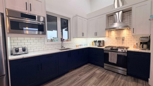 451043 Rng Rd 65, Wainwright, AB - Indoor Photo Showing Kitchen With Upgraded Kitchen