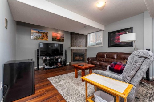 6813 41 Street, Lloydminster, AB - Indoor Photo Showing Living Room With Fireplace