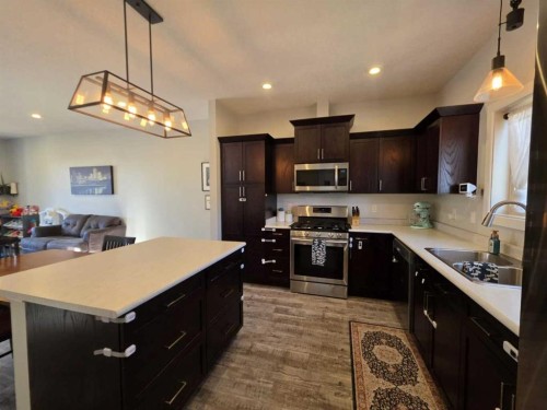 908 8 Avenue, Wainwright, AB - Indoor Photo Showing Kitchen With Stainless Steel Kitchen